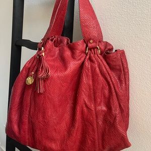 Jenrigo Maxi Bag
Italian snake skin leather.